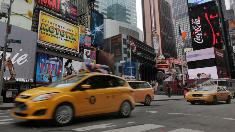 Taxis driving in Times Square